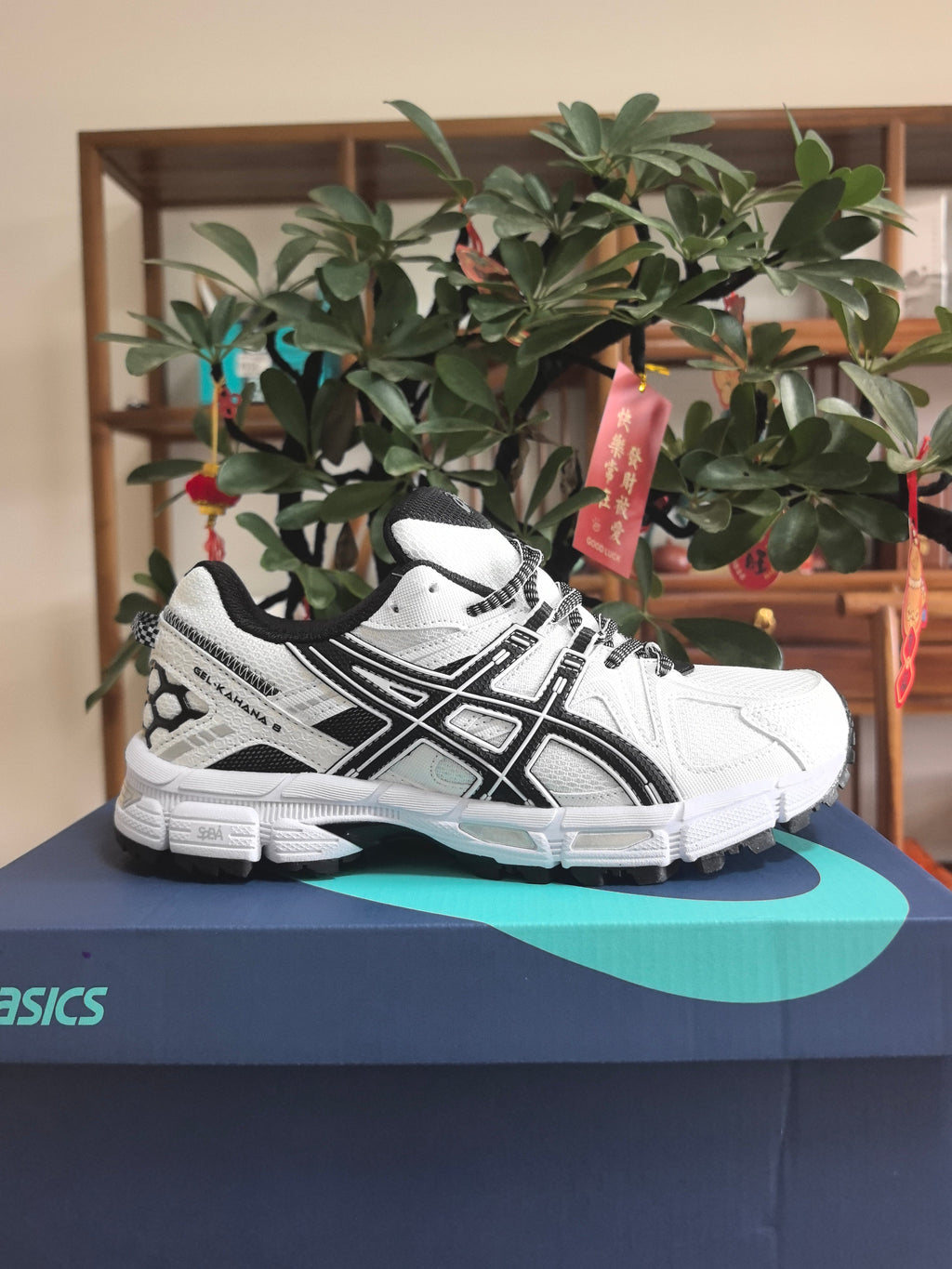ASICS K3 Sneakers in Black and White - product image from the listing.