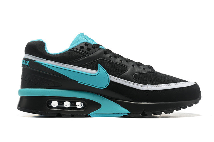 Nike Air Max Sneakers in Black and Turquoise - product image from the listing.