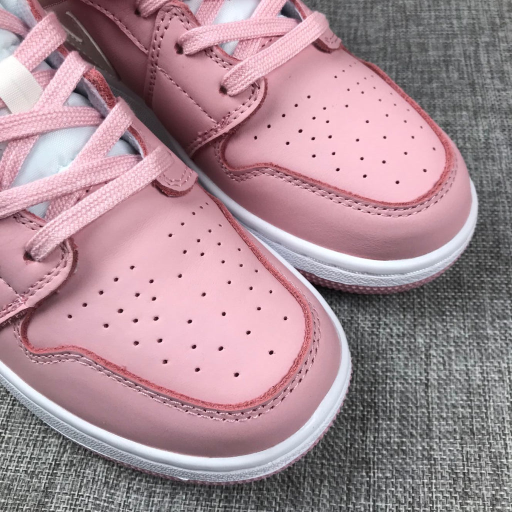 Women's Jordan 1 Mid Pink Sneakers 555112-100 - product image from the listing.