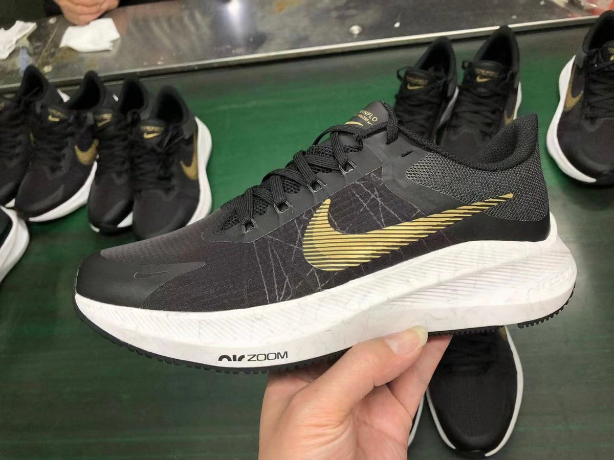Nike Zoom Winflo 8 Running Shoes in Black Gold CW3419-009 - product image from the listing.