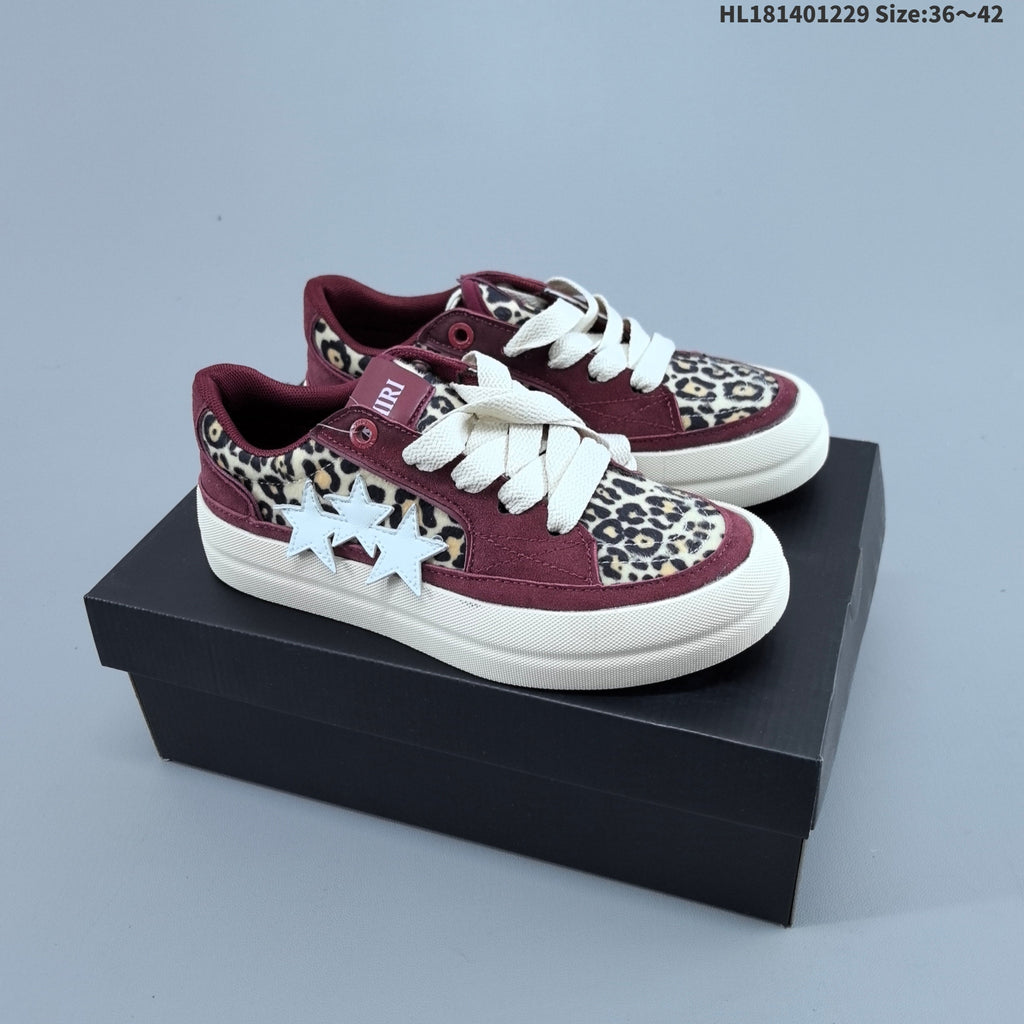 AMIRI Star Low-Cut Sneakers with Leopard Print Details - product image from the listing.