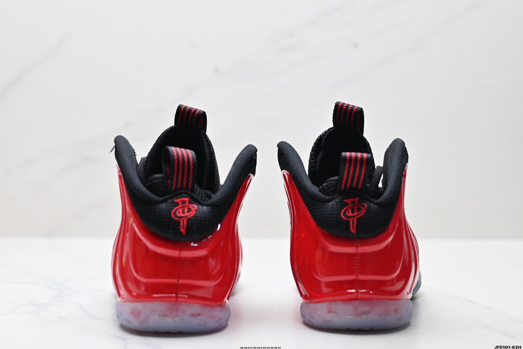 Nike Air Foamposite One Basketball Sneakers in Red and Black - product image from the listing.