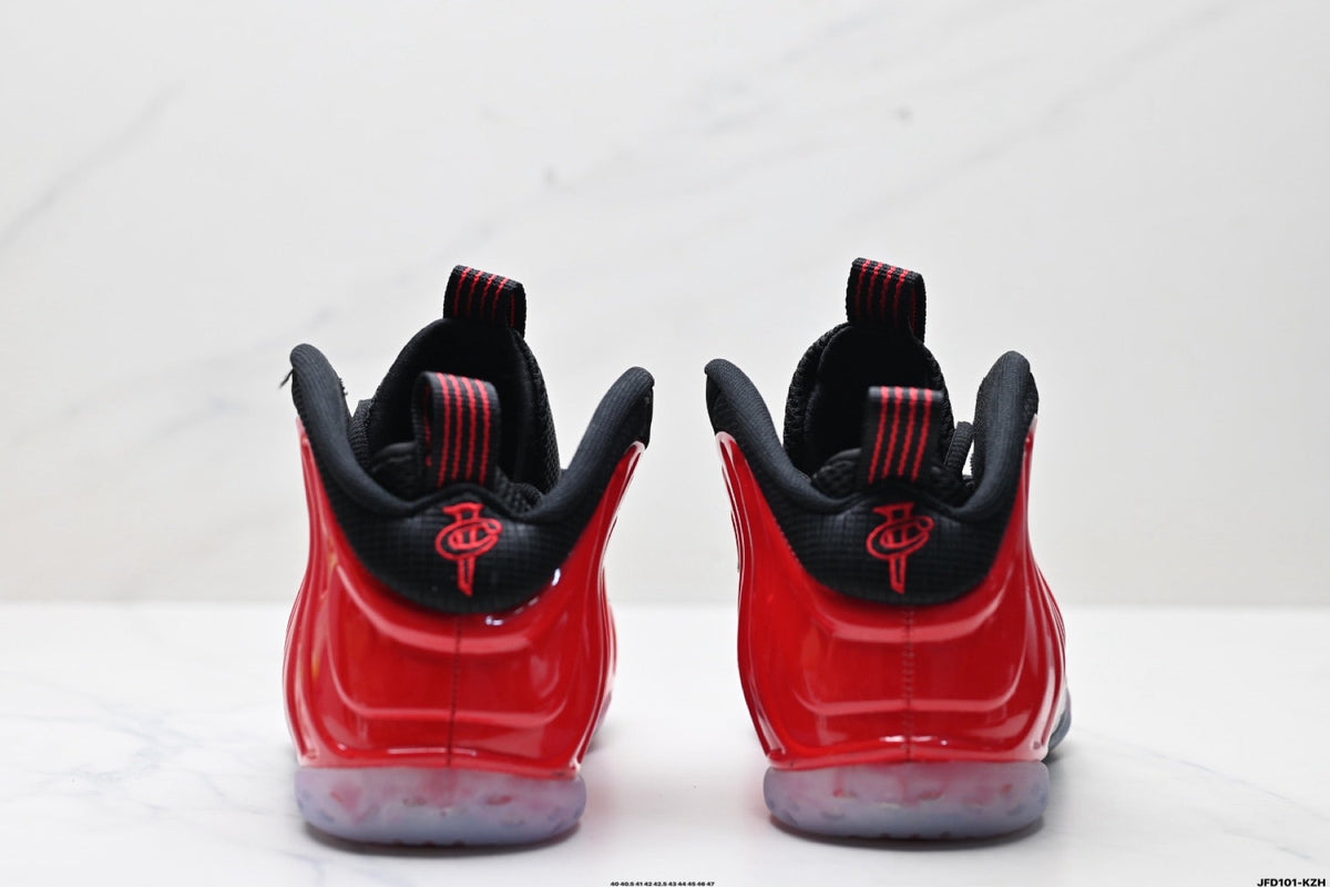 Nike Air Foamposite One Basketball Sneakers in Red and Black - product image from the listing.