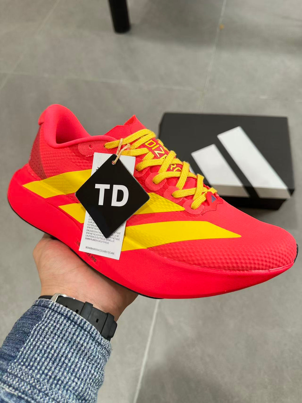 Adidas Lightstrike Pro Running Shoes in Red Yellow JQ4442 - product image from the listing.