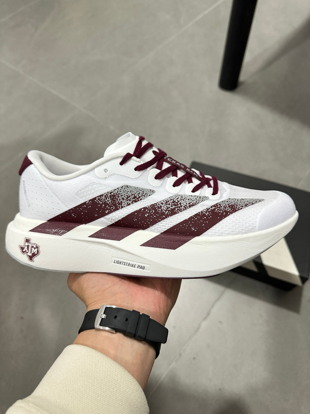 Adidas Lightstrike Pro Running Shoes in White Burgundy JQ4566 - product image from the listing.