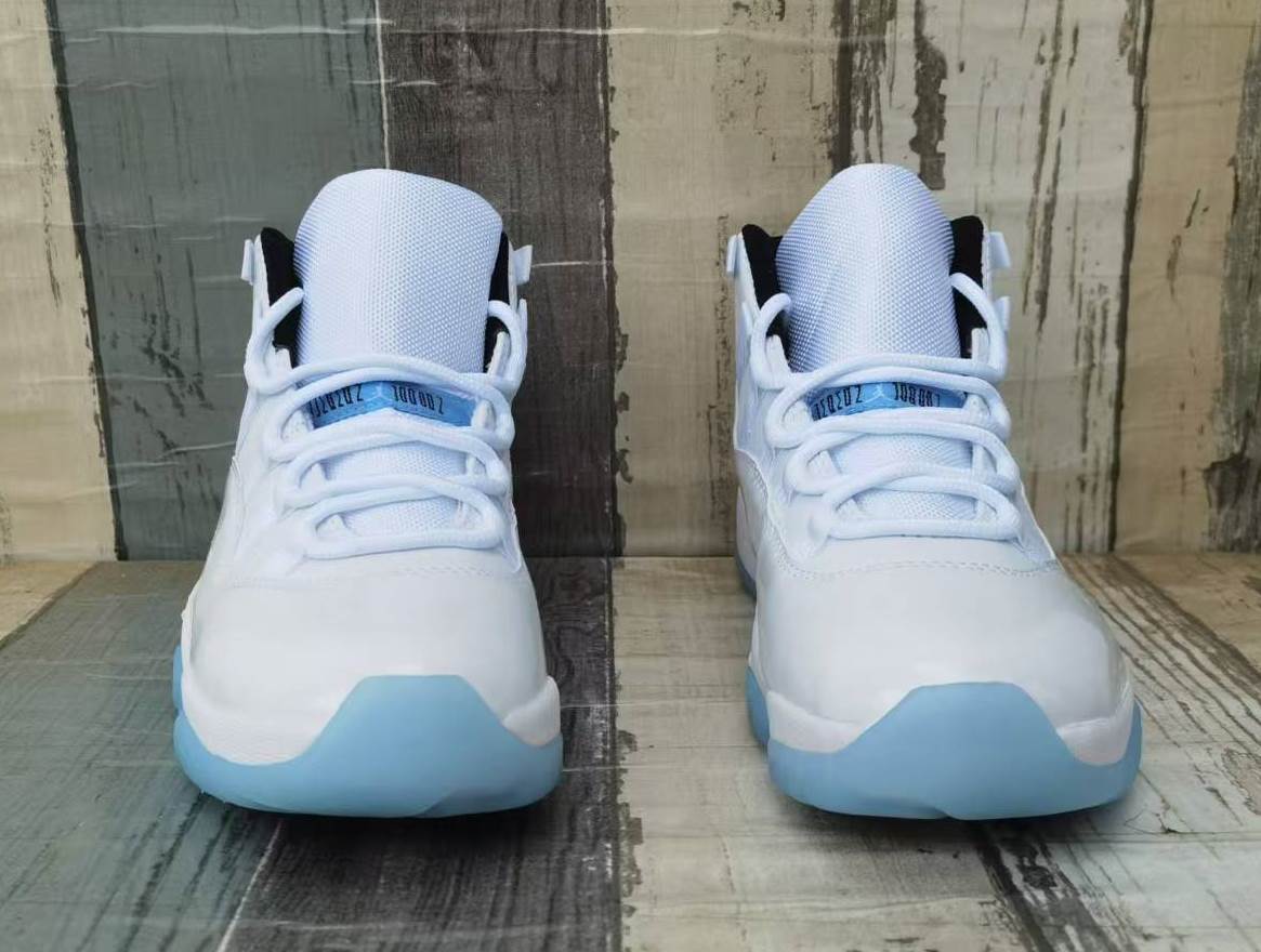 "White/Silver" Air Jordan 11 Retro (Pure Platinum) - product image from the listing.