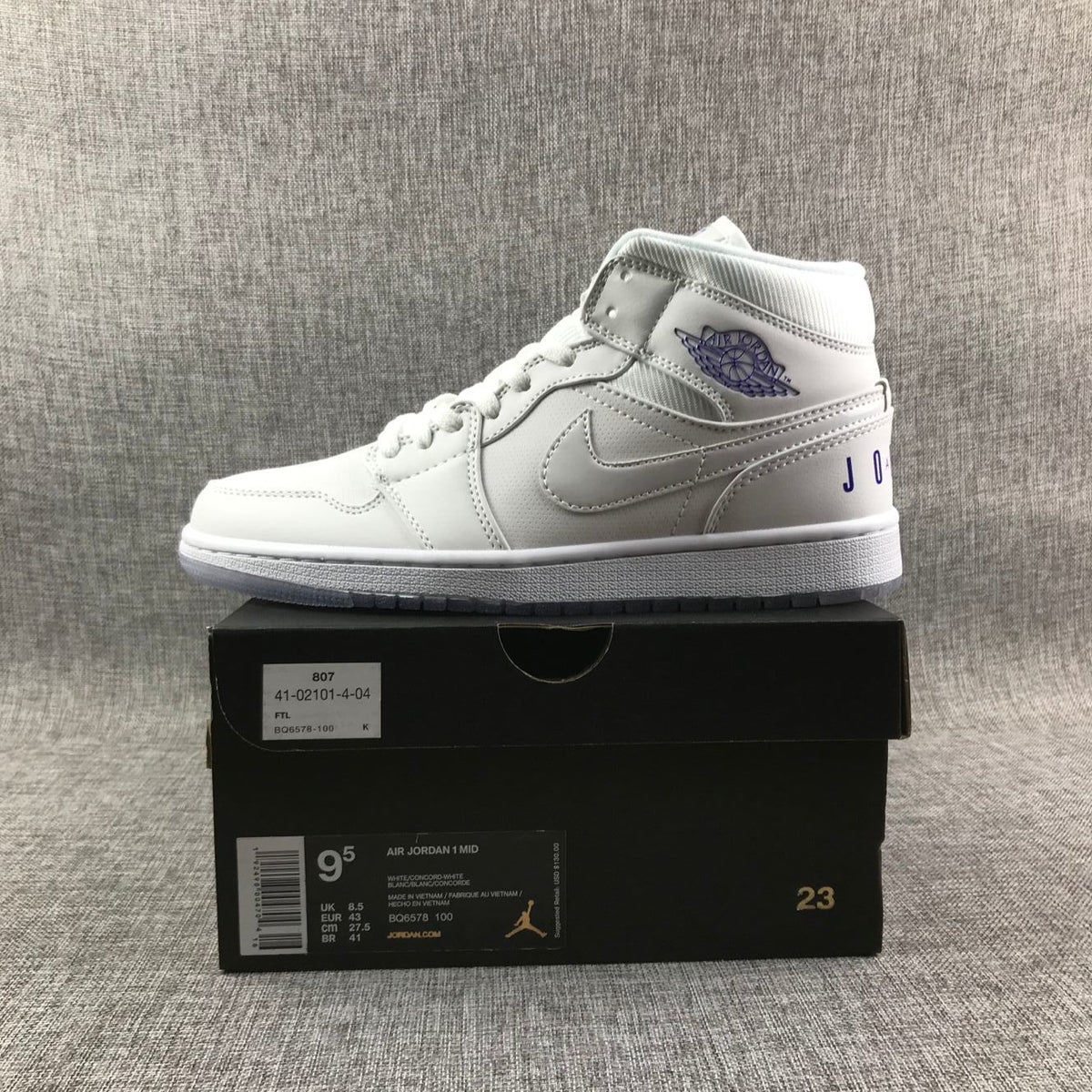 White Sneakers with Translucent Outsole - Air Jordan 1 Mid - product image from the listing.