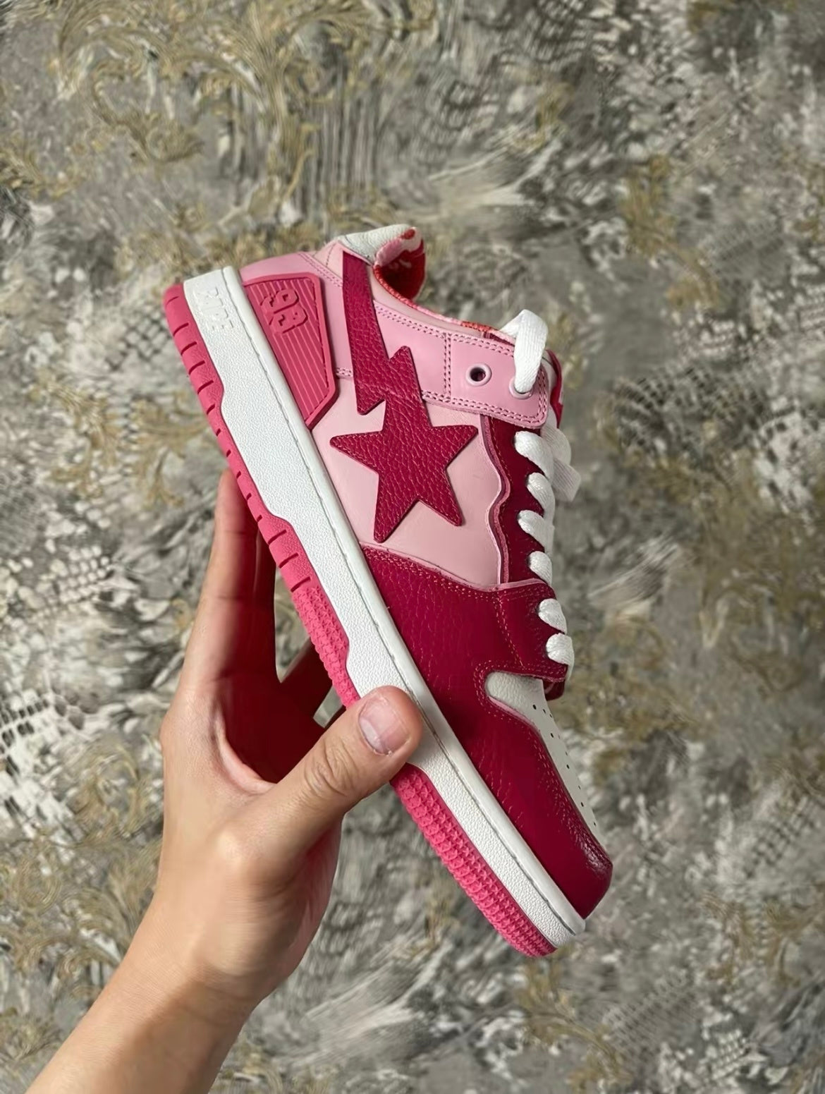 Pink and Burgundy BAPE SK8 STA Sneakers - product image from the listing.