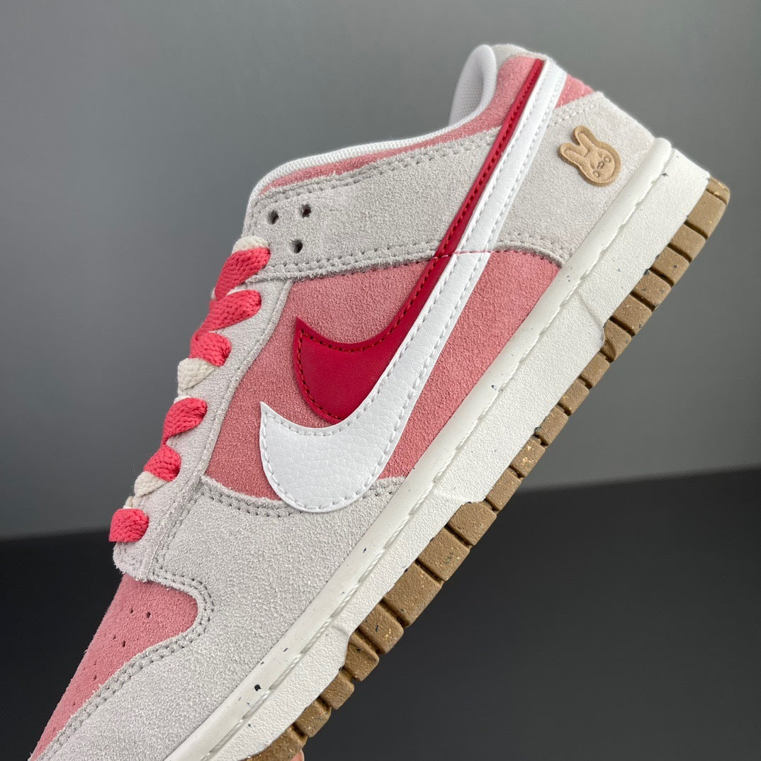 Nike Dunk Low SE Rabbit Year Sneakers in Pink White DO9457-117 - product image from the listing.