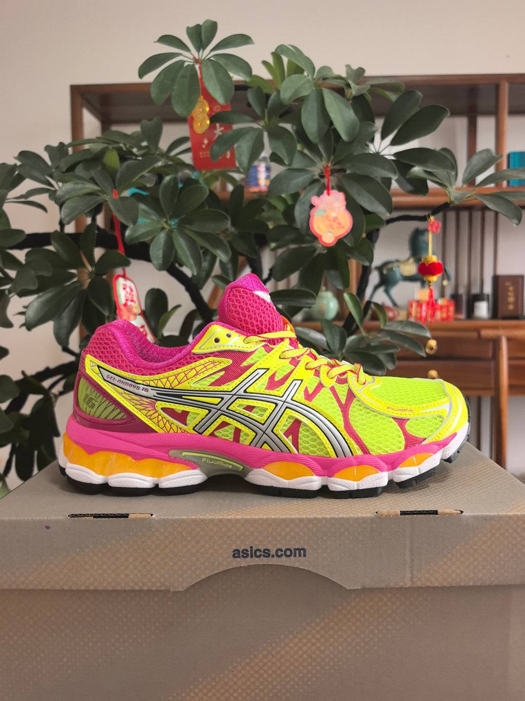 Pink and Lime ASICS GEL-Nimbus 16 Sneakers - product image from the listing.