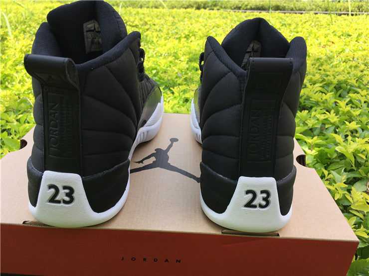 Air Jordan 12 Black Nylon High-Top Sneakers - product image from the listing.