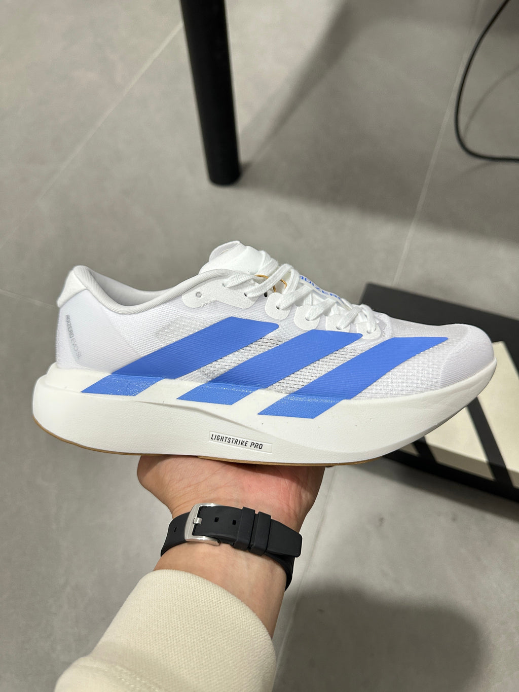 Adidas Lightstrike Pro Running Shoes in White Blue JS4454 - product image from the listing.