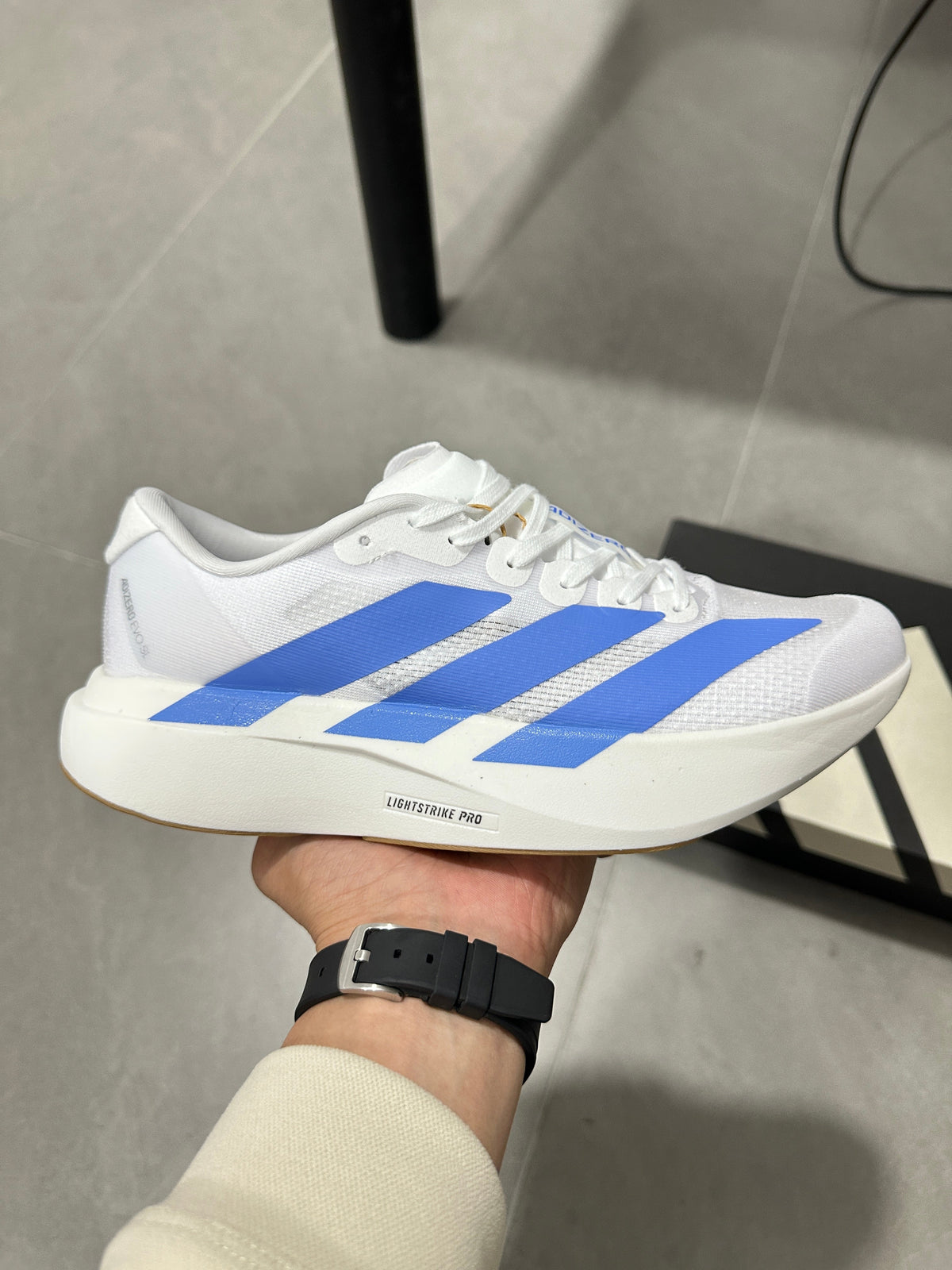 Adidas Lightstrike Pro Running Shoes in White Blue JS4454 - product image from the listing.