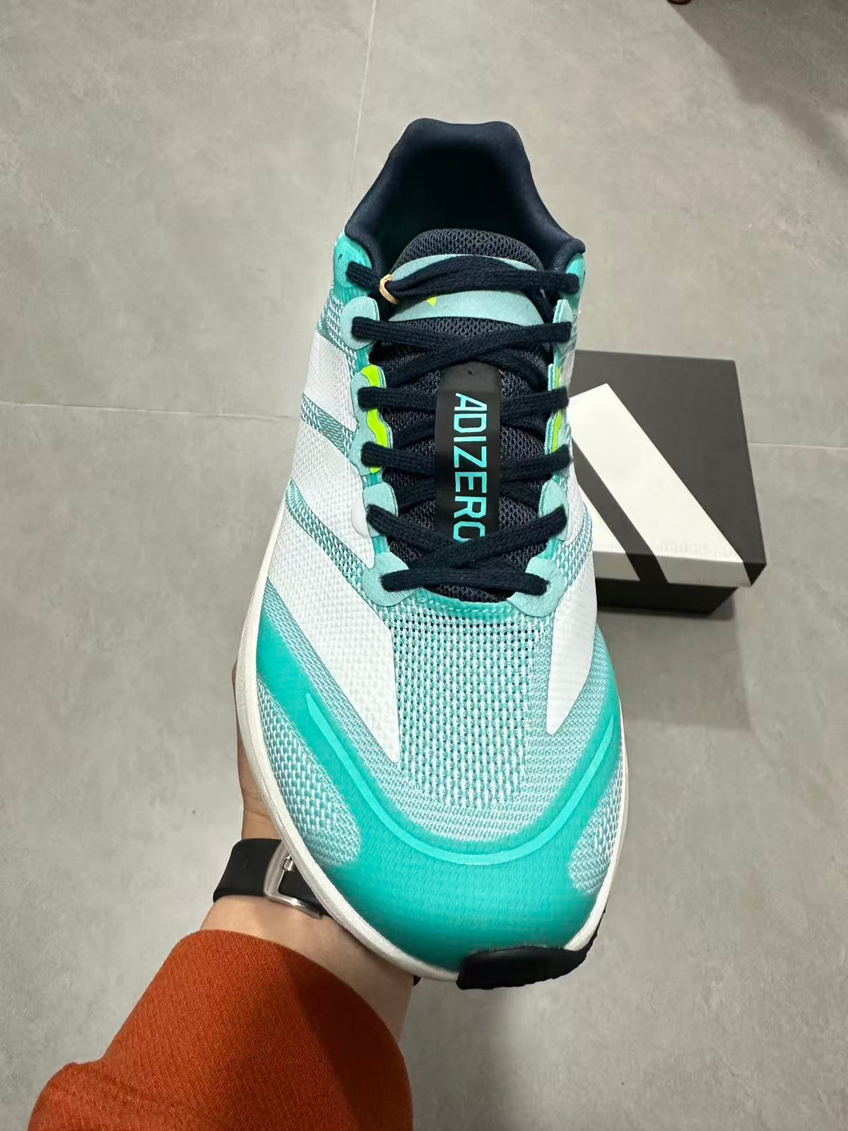 adidas Adizero Lightstrike Pro Running Shoes, in Mint and Black - product image from the listing.