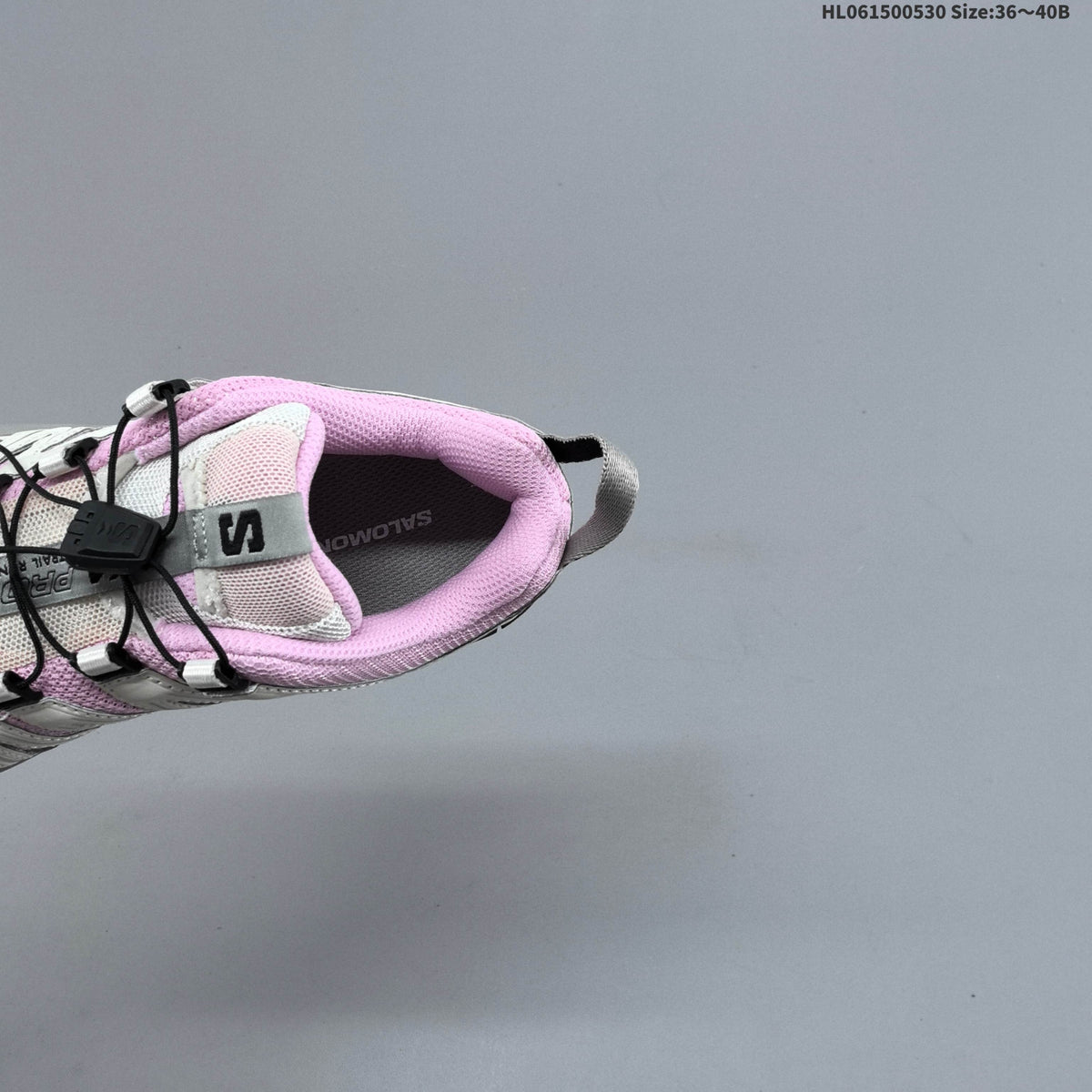 Pink and White Salomon XA PRO 3D Trail Running Shoes - product image from the listing.