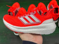 Adidas Ultraboost 23 Running Shoes in Red White HP3344 - product image from the listing.