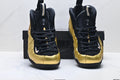 Nike Air Foamposite One Penny Hardaway Sneakers in Black Gold - product image from the listing.