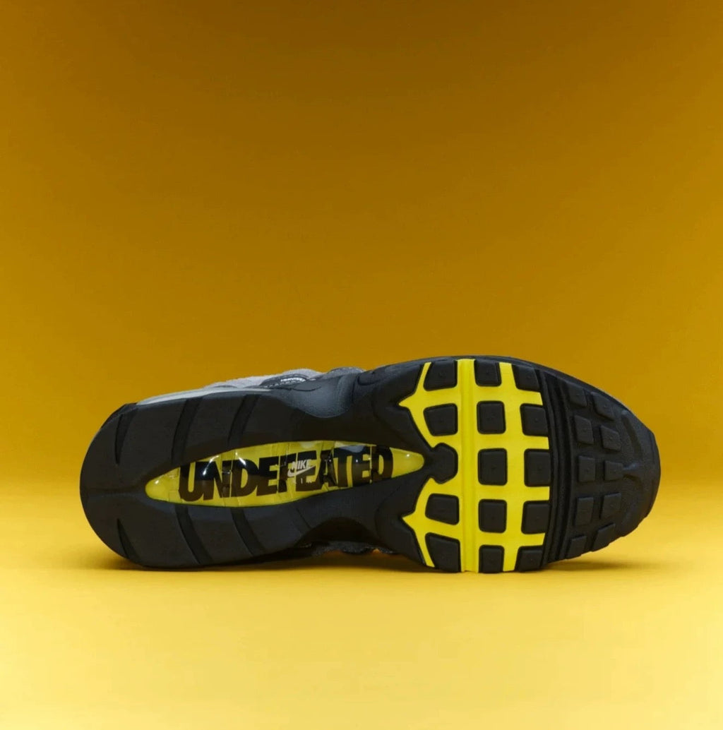 Nike Air Max 95 SP x UNDEFEATED Sneakers in Grey Yellow IB4523-002 - product image from the listing.