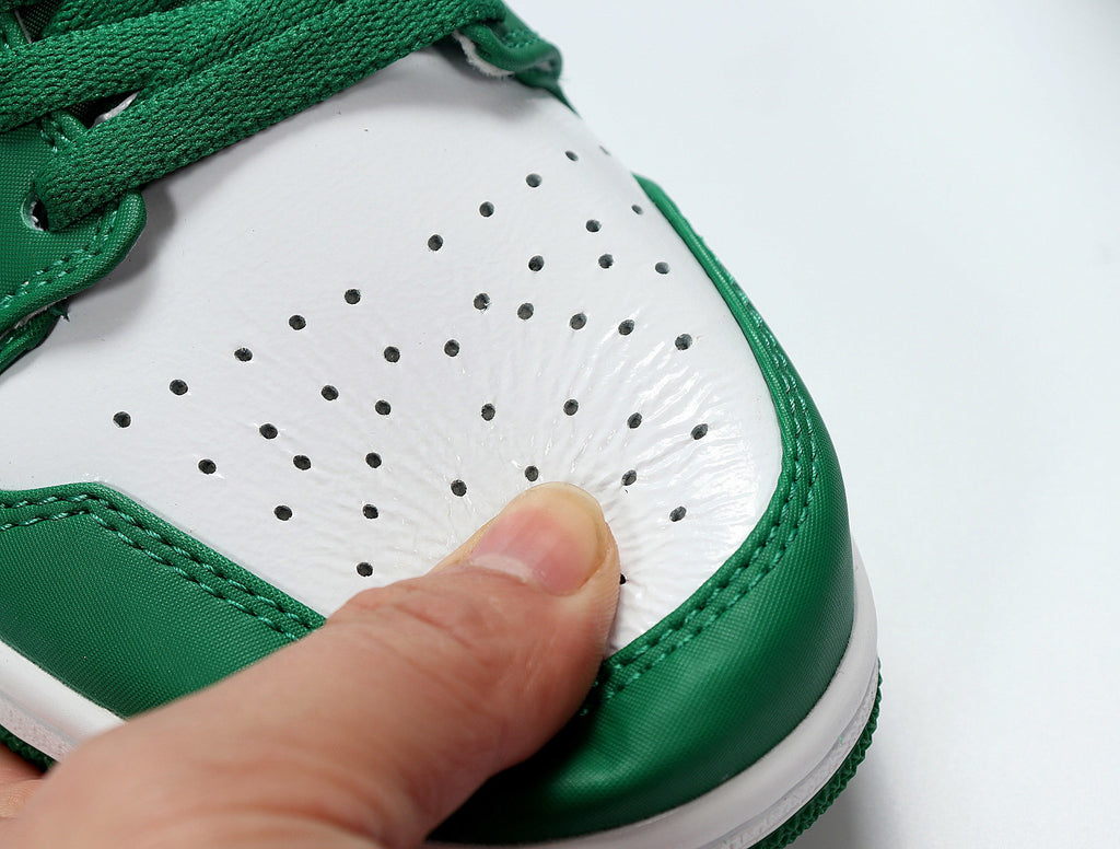 Air Jordan 1 Low White and Green Sneakers 553558-301 - product image from the listing.