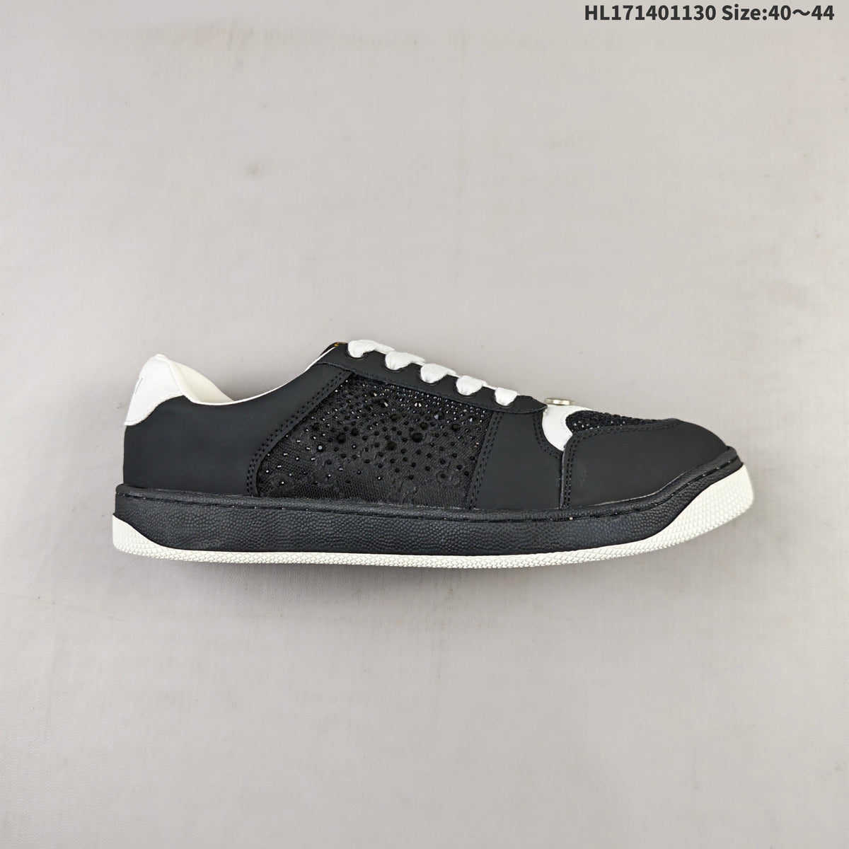 Gucci Screener Distressed Low-Top Sneakers in Black and White HL171401130 - product image from the listing.