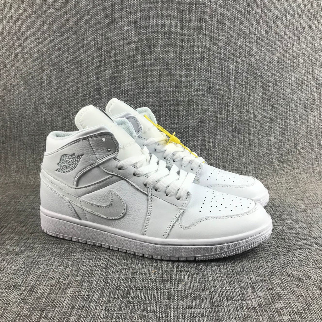 Air Jordan 1 Mid Sneakers in White - product image from the listing.