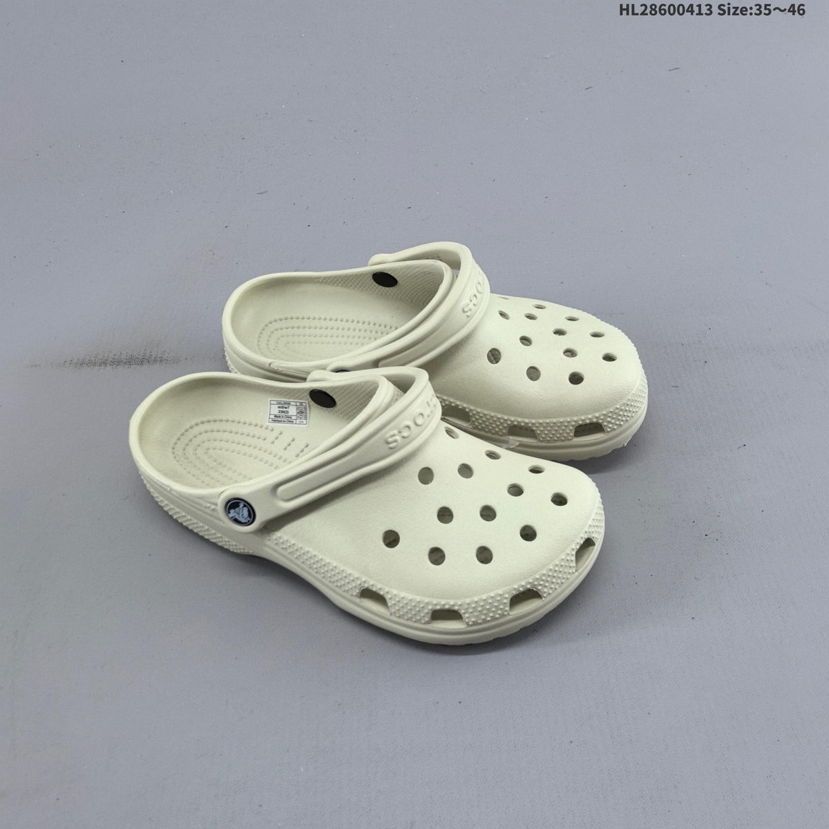 Crocs Classic Clog in Black or in Bone - product image from the listing.