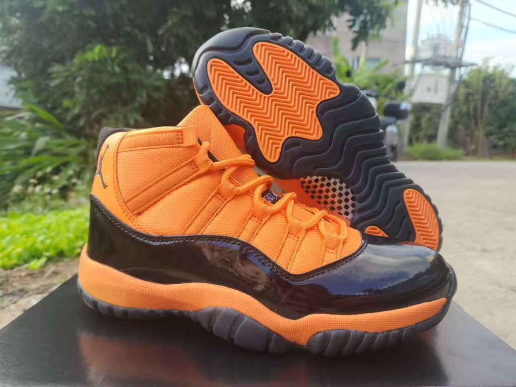 "Black/Orange" Air Jordan 11 Retro Sneaker - product image from the listing.