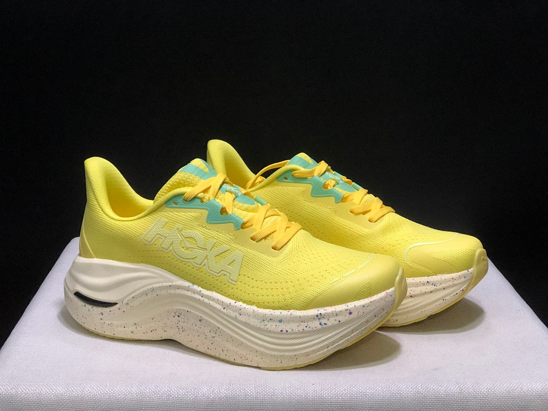 Yellow and Aqua HOKA Skyward X Running Shoes - product image from the listing.