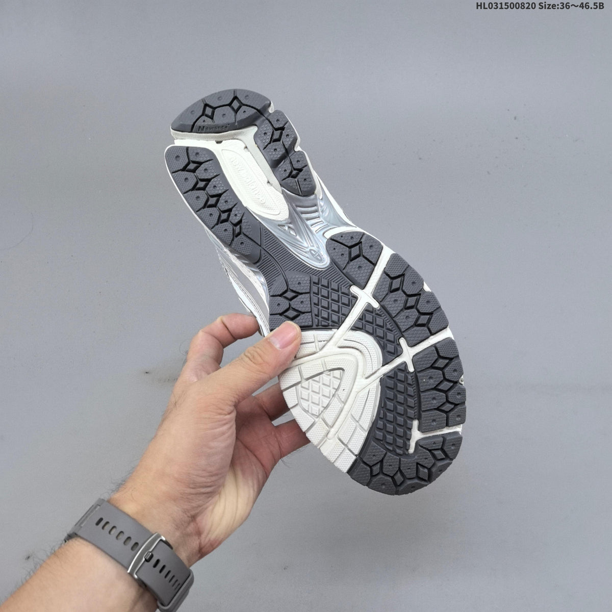 New Balance 1906R Sneakers in White Silver U1906RJM - product image from the listing.