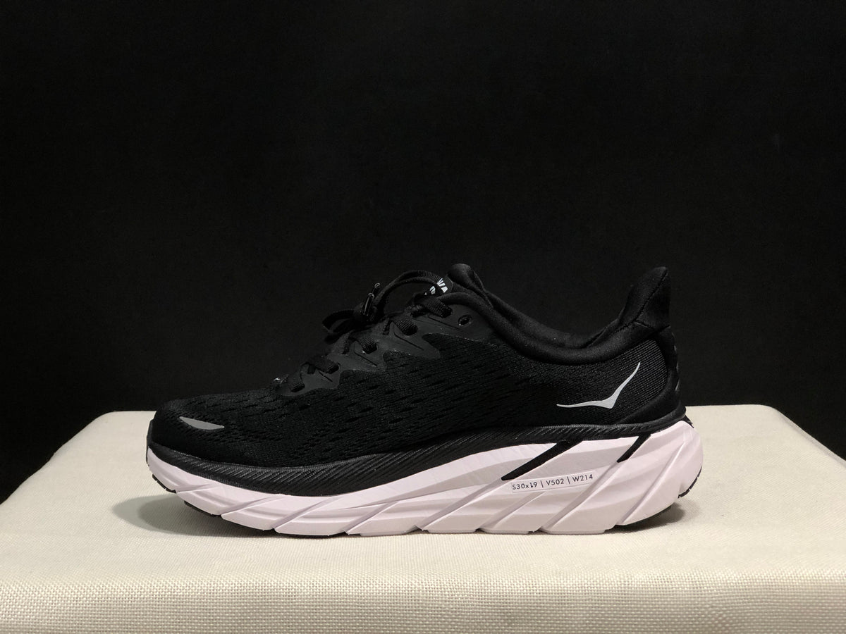 HOKA Clifton 8 Running Shoes, in Black and White - product image from the listing.