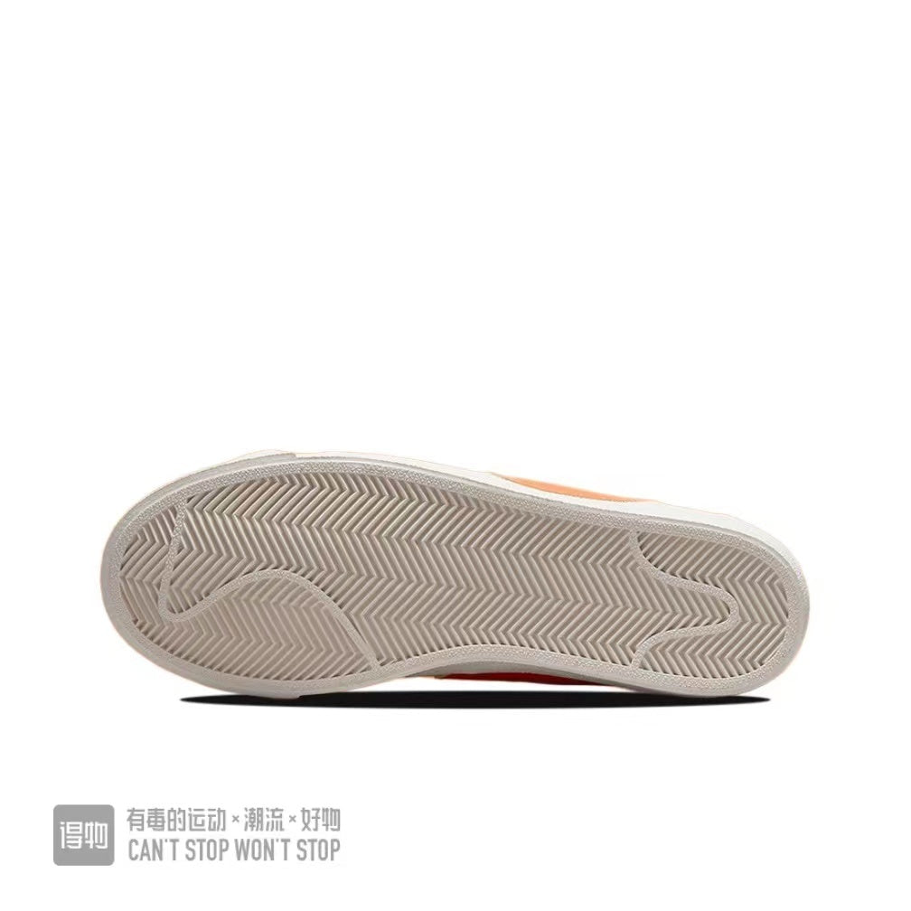 Nike Blazer Low 77 Sneakers in White Orange Volt - product image from the listing.