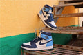 Air Jordan 1 Retro High OG Sneakers in Blue and White - product image from the listing.
