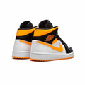 Women's Jordan Air Jordan 1 Mid SE "Orange Black" - product image from the listing.