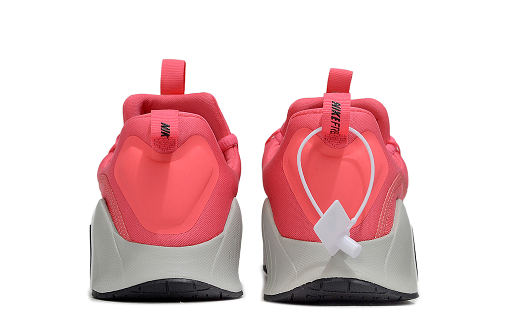 Coral Pink and Gray Nike Free Metcon 5 Sneakers - product image from the listing.