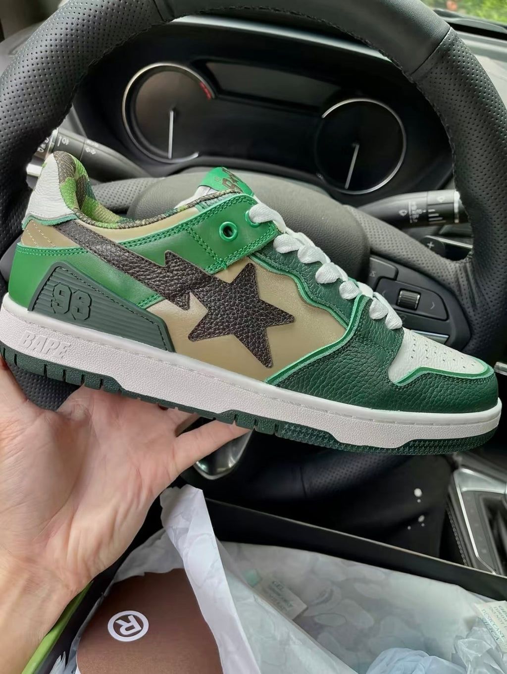 BAPE SK8 STA Low-Cut Sneakers in Green Camo - product image from the listing.