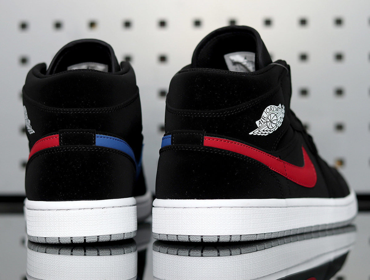 Jordan 1 Retro High Sneakers in Black Red Blue 554725-065 - product image from the listing.