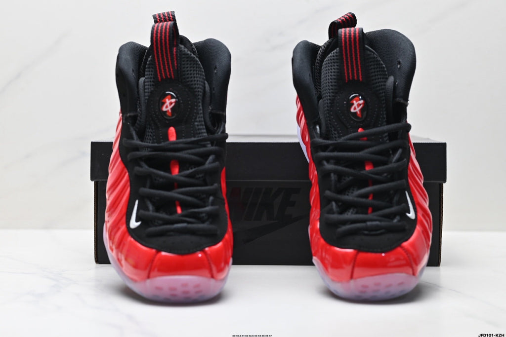 Nike Air Foamposite One Basketball Sneakers in Red and Black - product image from the listing.