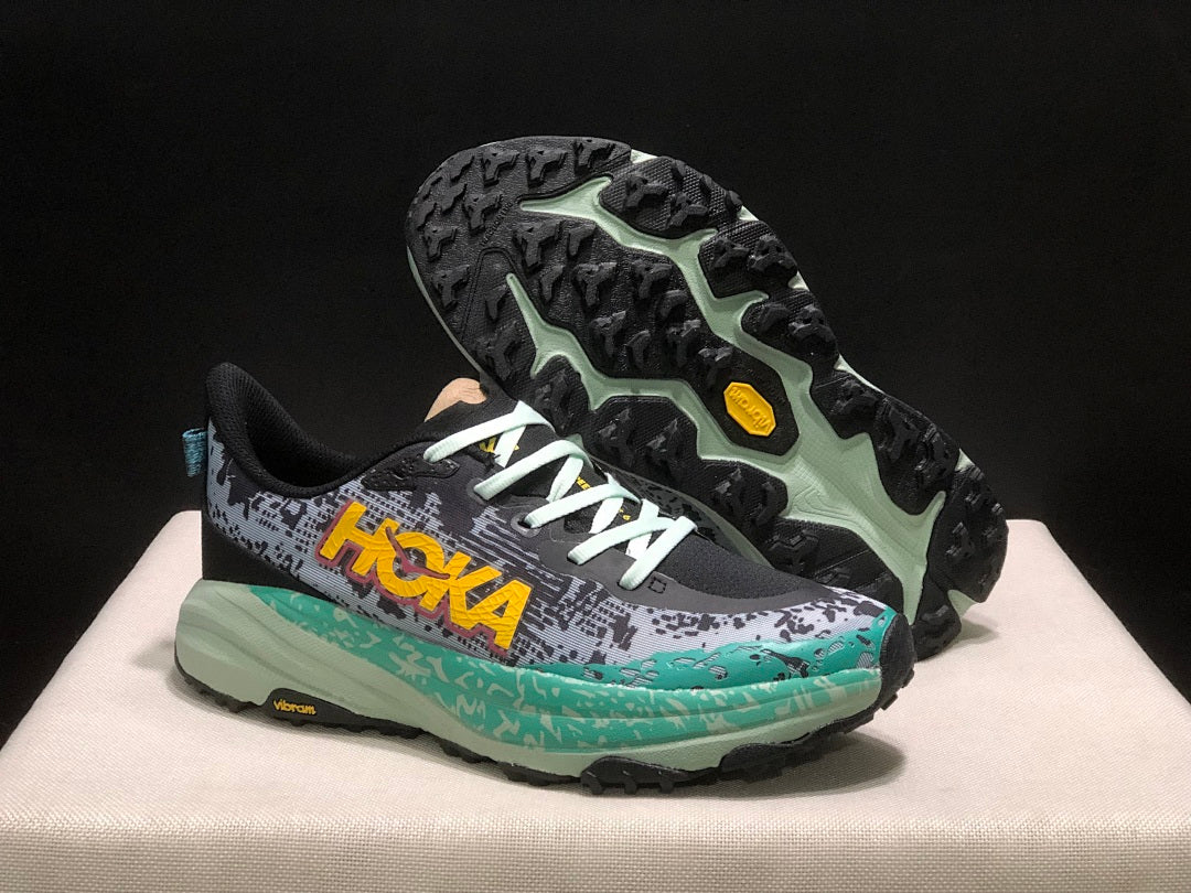 HOKA Speedgoat 6 Trail Running Shoes, in Gray and Teal - product image from the listing.