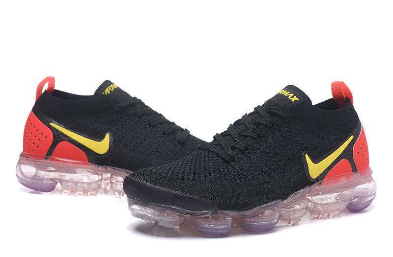 Nike Air VaporMax Flyknit 2 Sneakers in Black and Yellow - product image from the listing.