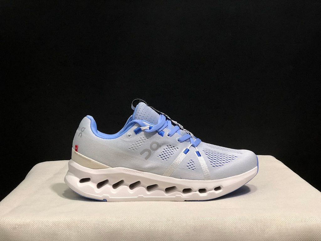 On Cloudsurfer Running Shoes, Heather in White and Blue - product image from the listing.
