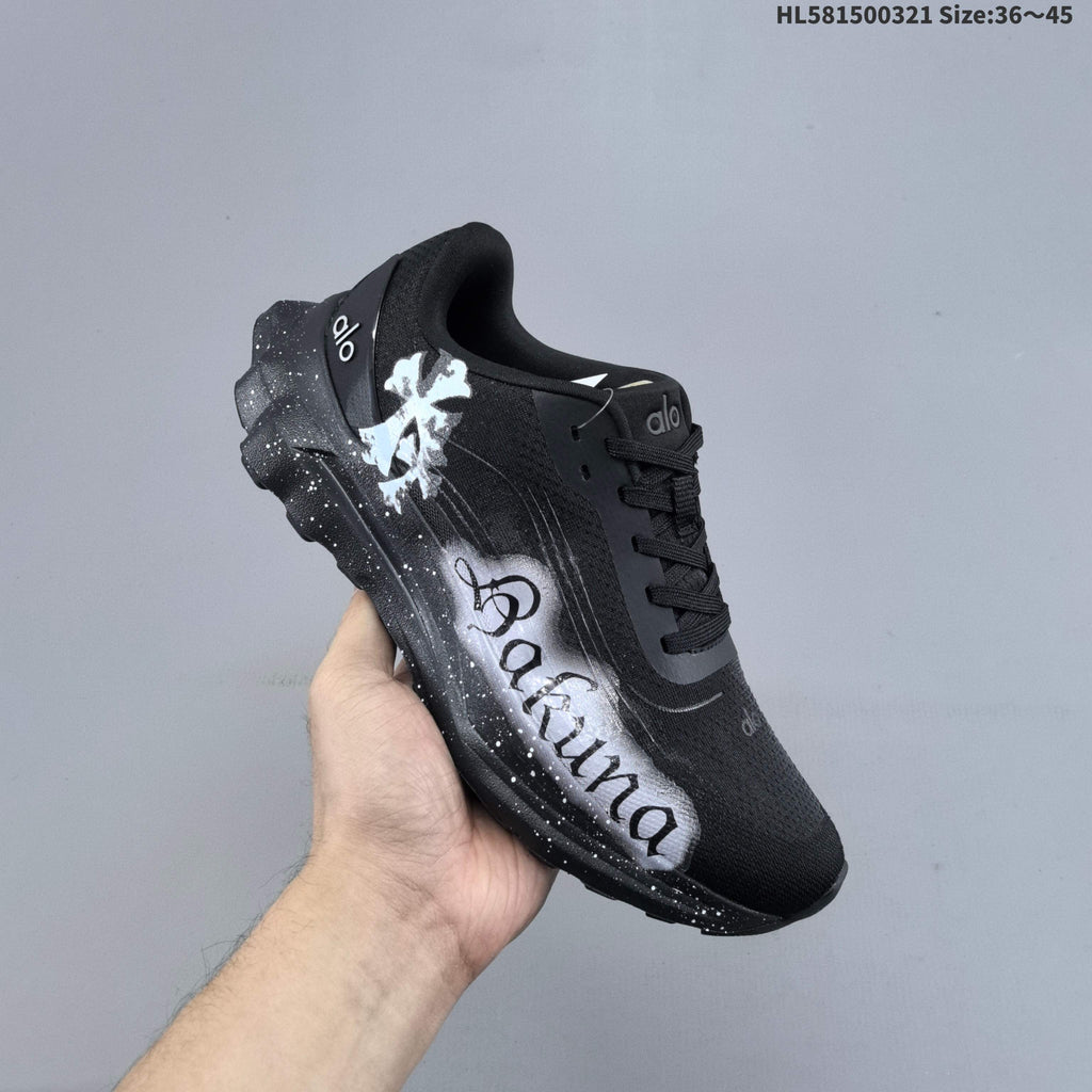 Alo Yoga Alo Runner Graphic Running Sneakers, in Black - product image from the listing.