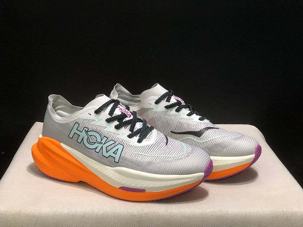 Gray and Orange HOKA Mach X 2 Running Shoes - product image from the listing.