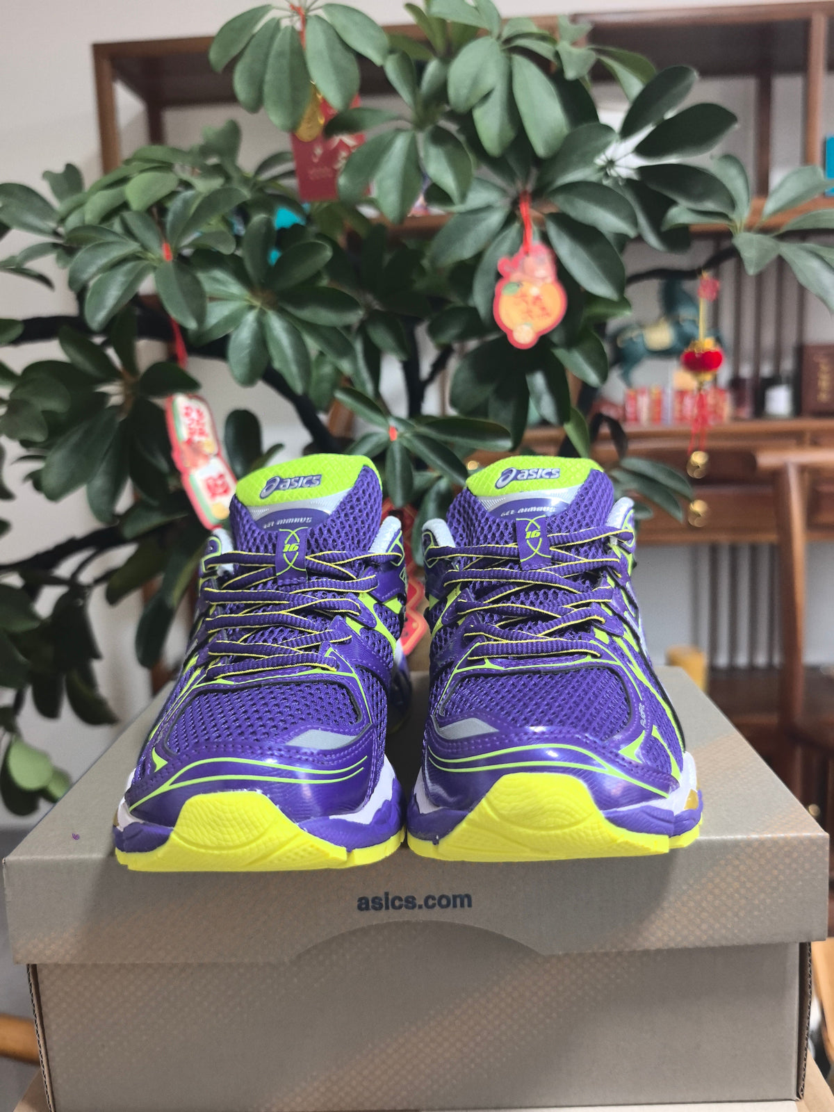 ASICS Gel-Nimbus 16 Sneakers in Purple Volt - product image from the listing.