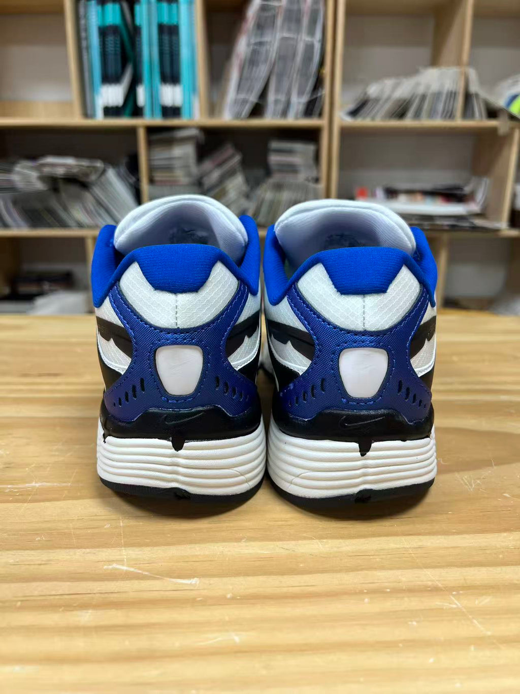 Nike P-6000 Sneakers in White Blue Black IZ4752-100 - product image from the listing.