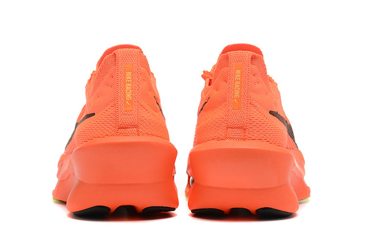 Bright Red and Black Nike Racing Knit Sneakers - product image from the listing.