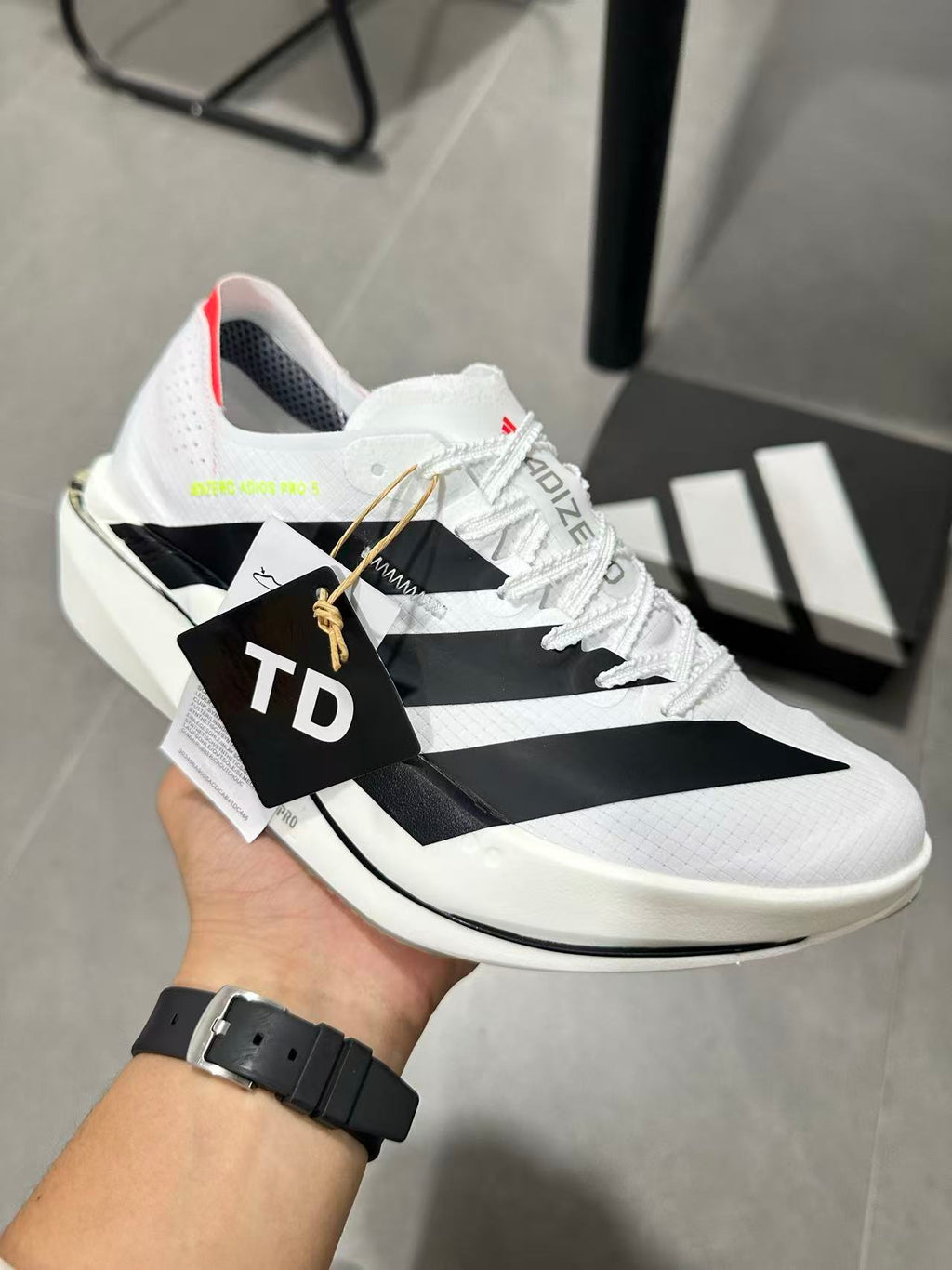adidas Lightstrike Pro Running Shoes in White Black KI8290 - product image from the listing.