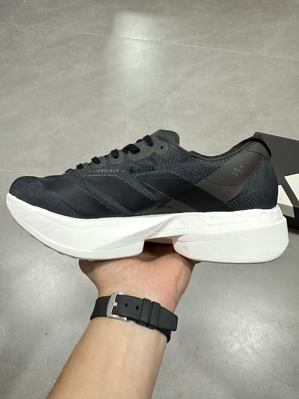 adidas Lightstrike Pro Running Shoes in Black Gray - product image from the listing.