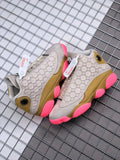 Air Jordan 13 CNY Sneakers in White, in Gold and Pink - product image from the listing.