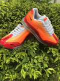 Orange and Red Nike Air Max 720 Sneakers - product image from the listing.