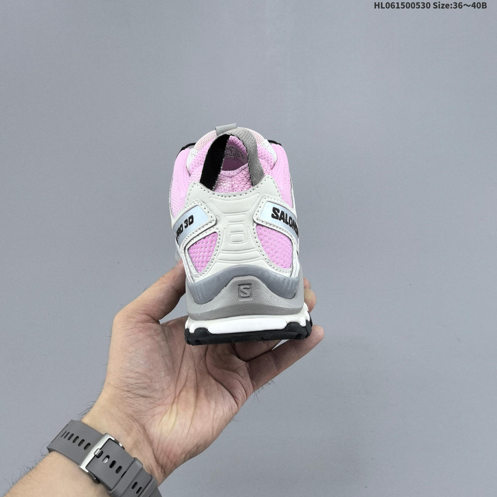 Pink and White Salomon XA PRO 3D Trail Running Shoes - product image from the listing.